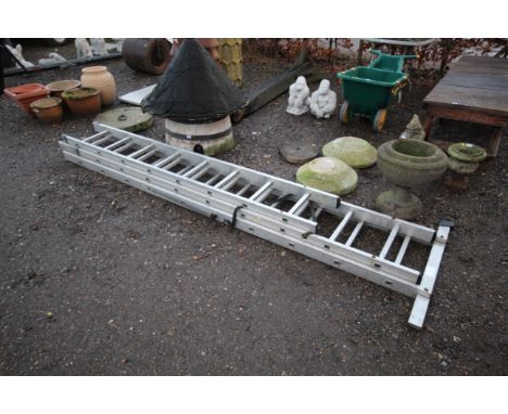 A three stage aluminium extending ladder