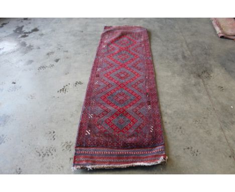 An approx. 8'4" x 2'3" Meshwani runner