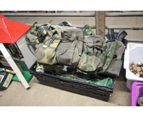 A quantity of army utility belts, rucksacks etc.