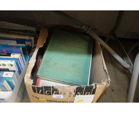 A box of assorted books and Ordnance Survey maps