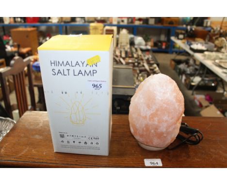 A Himalayan salt lamp with original box