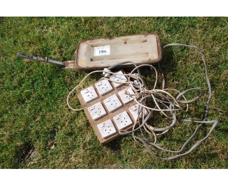 A 110v work light and 9 socket 13 amp circuit board.