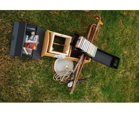 A lead-lamp, walking sticks, a ceiling light, boxes of cassettes, etc., 