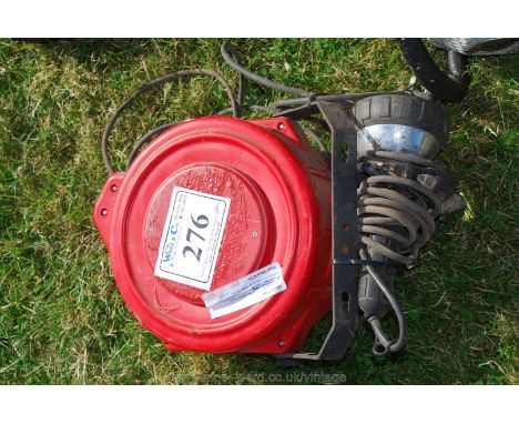 A 240 volt retractable inspection light.