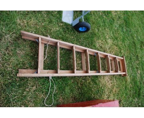 A 7 rung wooden step ladder.