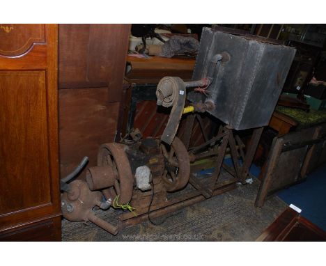 A 1952 Lister Junior twin fly wheel model B tank cooled petrol Stationary Engine, serial no. 1147B2 mounted on a steel rail b