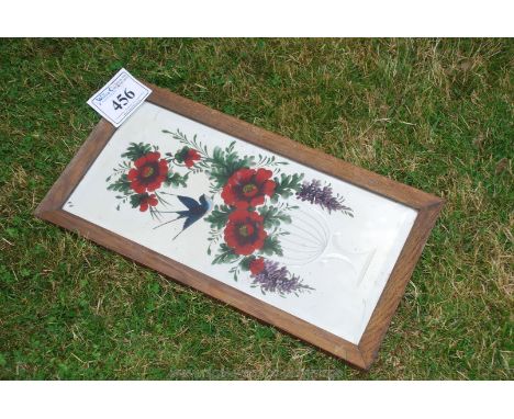 Floral painted and cut glass wooden framed mirror depicting a bird and a flowering bough. 