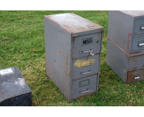 A three drawer filing/tool storage cabinet.