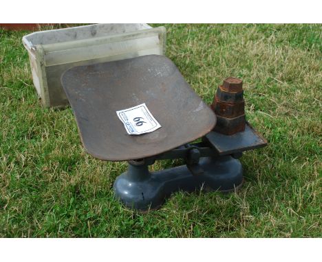 A balance scales with weights.