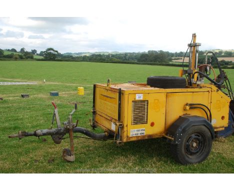 A hydraulically driven hole-borer with Lister Petter 3 cylinder diesel engine and mounted on fast tow trailer with spare whee