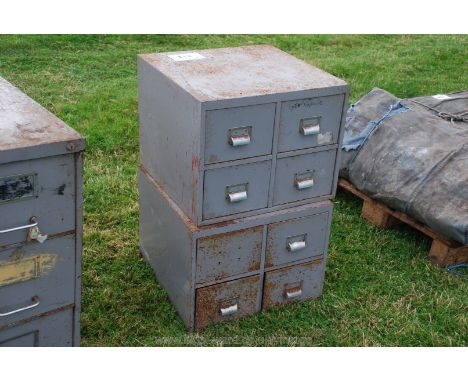 Two 4 drawer filing/tool storage cabinets.