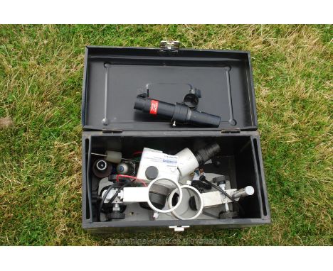 A boxed binocular Microscope with lighting equipment.