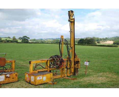 A fork lift type pile driver/rammer, (Very heavy duty).