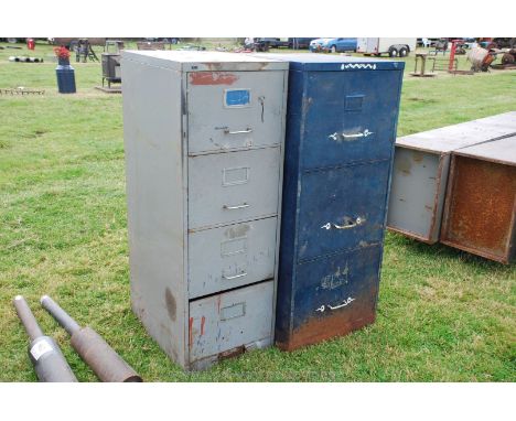 A pair of four drawer filing/tool storage cabinets.