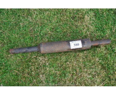 A tractor exhaust pipe/ silencer. 