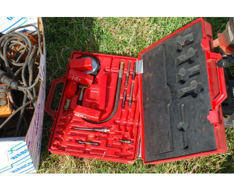 An AST diesel engine compression test kit, with adaptors, good condition.