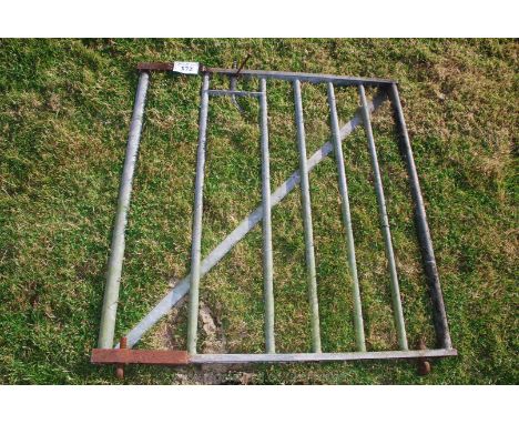 A galvanised field gate 4' x 4'.