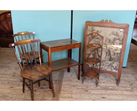 A pair of Ibex chairs, an occasional table, a mahogany cakestand and a firescreen