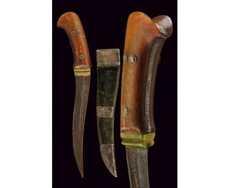 dating: Mid 19th Century provenance: India, Strong, curved, single-edged blade with deep groove on the back. Grip with horn g