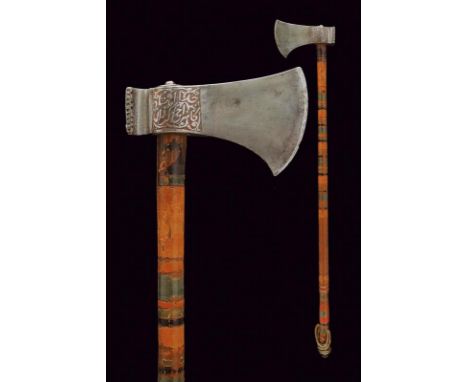 dating: 19th Century provenance: Indopersia, Convex-edged axe, slightly elongated downwards. Both facets engraved at the base