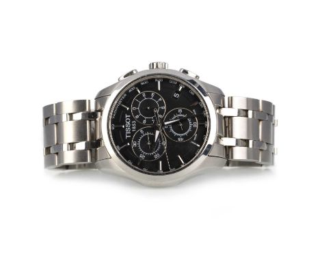 TISSOT, STAINLESS STEEL QUARTZ WRIST WATCH the round dial with baton hour markers, three subsidiary dials and date aperture, 