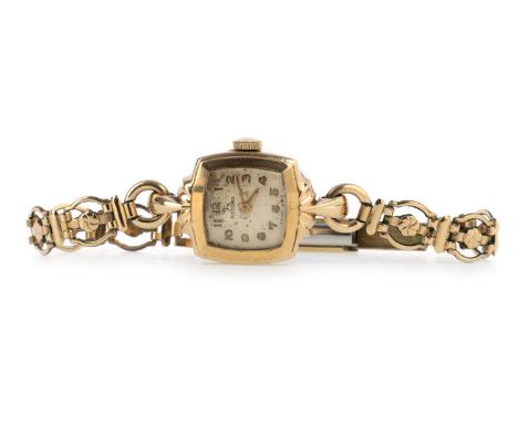 RECORD, NINE CARAT GOLD CASED MANUAL WIND WRIST WATCH  the cushion shaped dial with Arabic hour markers, 17mm case with perso
