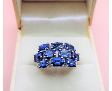 Sterling Silver 6ct Tanzanite Ring 'NEW' with Gift Box. A fabulous ring in sterling silver set with a cluster of 10 x 6x4mm (