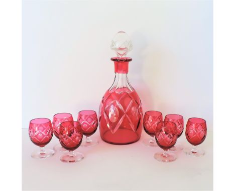 Vintage French Glass Decanter &amp; Liqueur Glasses.  A fine quality ruby glass  decanter and 8 glasses. Decanter is 21cm hig
