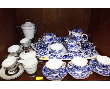 SECTION 38. A mid 19th century Coalport Mandarin pattern blue and white cabaret tea set, together with a Continental silver l