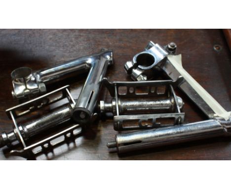 1 Vintage adjustable stem, unbranded, down swept, 1 Cinelli down swept stem, 1 pair of serviceable CL pedals