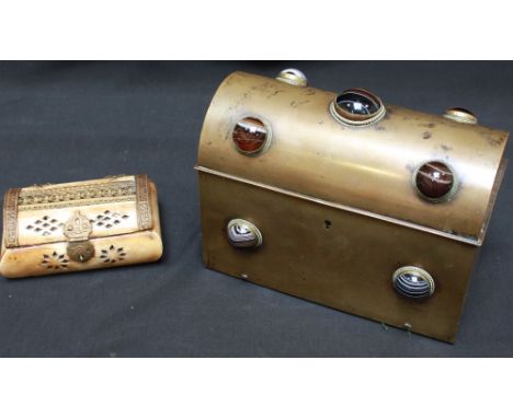A Victorian brass trinket box with domed lid set with cabochon cut agates together with an oriental carved bone, brass mounte