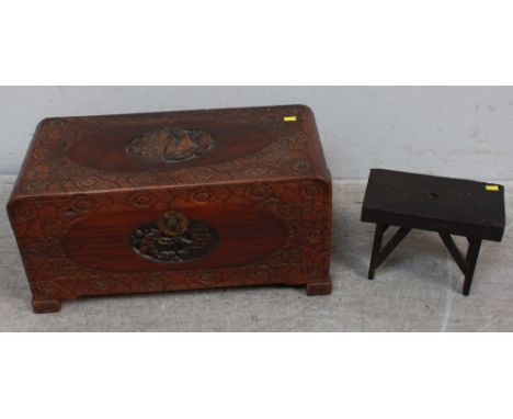 A Chinese carved camphor wood trunk, carved all over with, flowers and a central landscape scene, together with an 18th centu