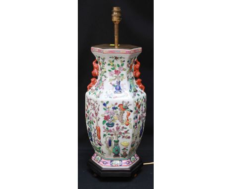 A 20th century Chinese canton style vase converted to a lamp, of hexagonal baluster form and decorated all over with brightly