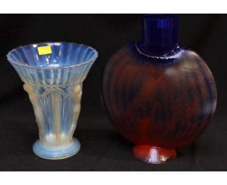 A large Kosta Boda glass moon flask, of ribbed blue glass with orange spray decoration; together with a French opalescent gla