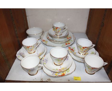 SECTION 24. A 1930s Thomas Forrester & Sons Phoenix ware porcelain teaset painted and printed with flowers, comprising: six t