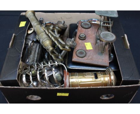 A small quantity of silver-plated items including cased spoons, toast rack, etc, a brass postbox moneybox, canon and set of l