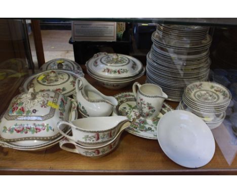 A large quantity of "Indian Tree" pottery dinner service, including tureens and covers, sauce boats, comports, plates bowls e