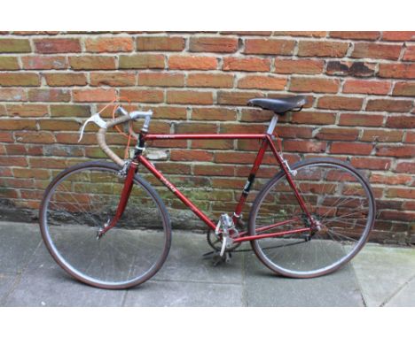 1960's VIKING IAN STEEL TOUR OF BRITAIN MODEL in maroon.  Frame size 22 ¾ C - T seat tube. 22 ¾ C - C top tube.  Bike appears