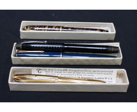 Four vintage fountain pens, including a Waterman pen with 14ct gold nib, lever filler and amber coloured barrel; a Conway Ste