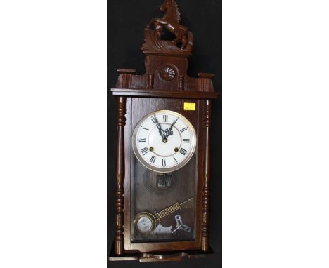 A Vienna style wall clock, with eight-day movement striking a gong, white dial with Roman numerals, rearing horse pediment, c