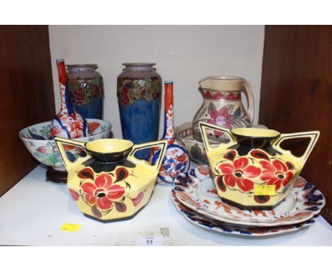 SECTION 13. A pair of Royal Doulton stoneware tube-lined vases, a pair of Japanese Satsuma bottle vases, a pair of Masons Iro