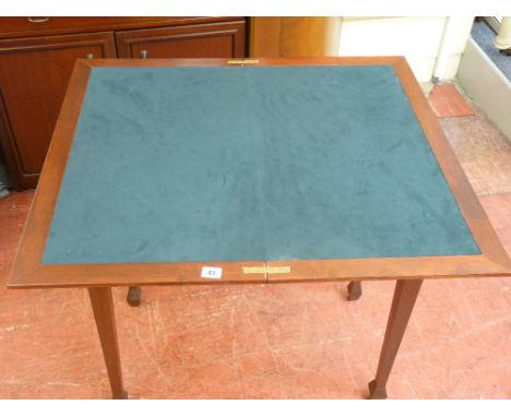 Modern foldover baize lined card table on tapered supports