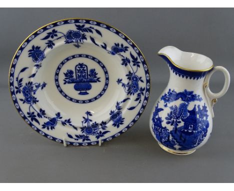 Royal Worcester blue Willow narrow necked jug and a Minton circular Delft patterned dish