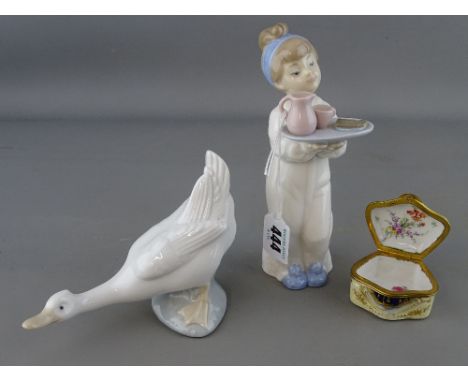 Nao figure of a belligerent goose, a Nao figurine of a young figure with a breakfast tray in hand and a porcelain and metal p