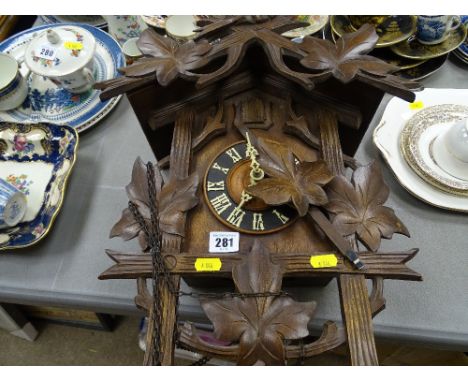 Cuckoo clock with weights