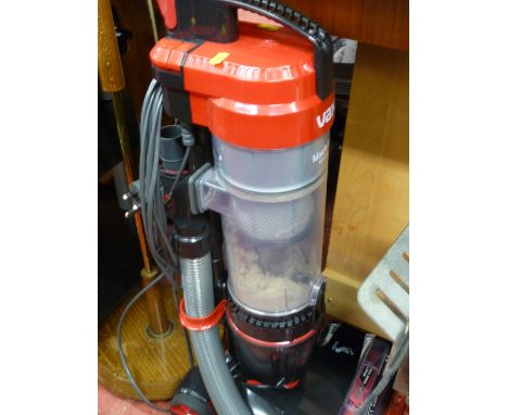 VAX Mac Air Revive upright vacuum cleaner and a metal and brass effect standard lamp E/T