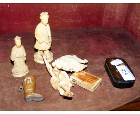 A lacquered snuff box, boot vesta case, ivory figures, etc.