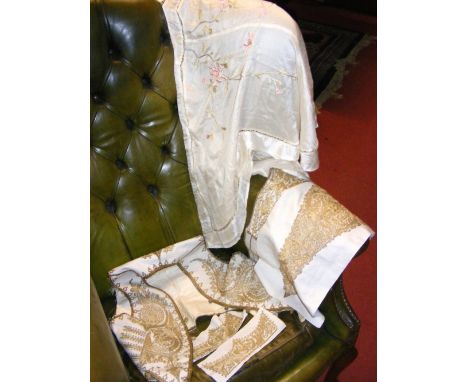 A gilt thread embroidered child's bolero jacket, four similar embellishments and an embroidered blouse
