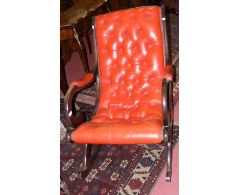 Mahogany framed rocking chair with button back and seat