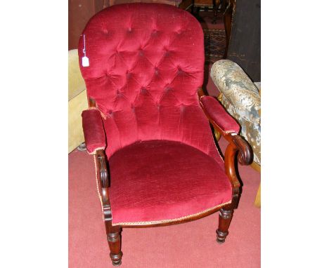 Victorian easy chair with turned front supports and button backrest